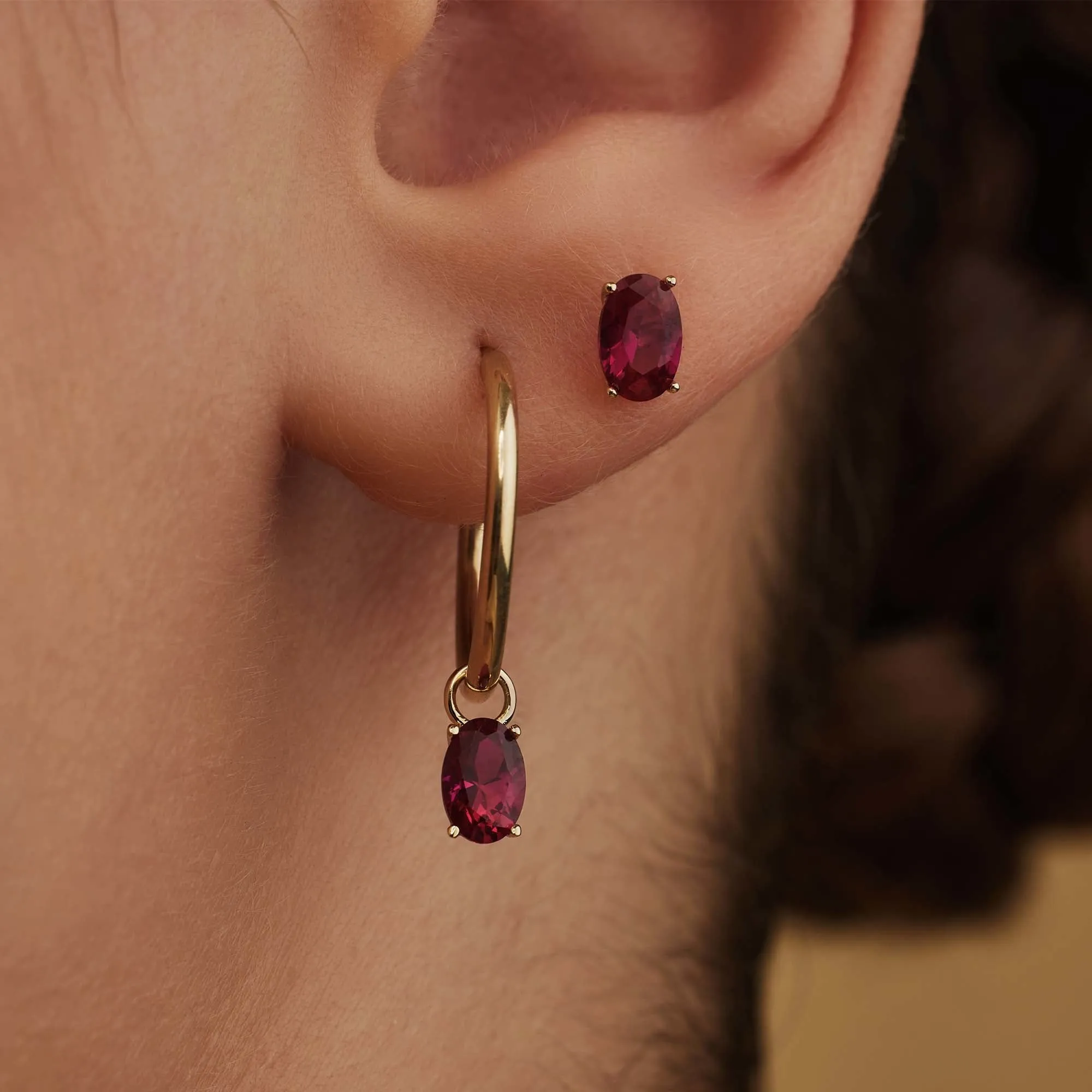 Baguette Roux 14 karat gold stud ear studs with red zirconia stone