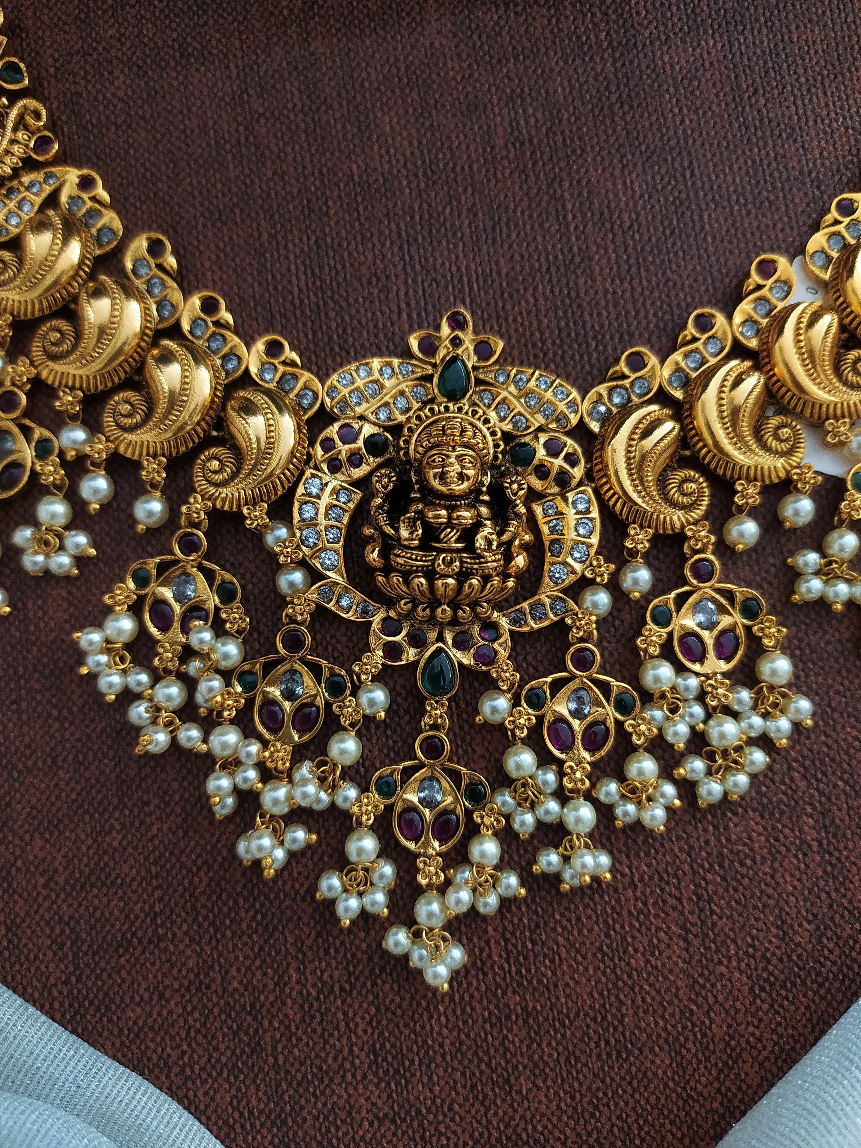 Center Lakshmi Pendant Antique Necklace Set Having Kemp Stones and Pearls