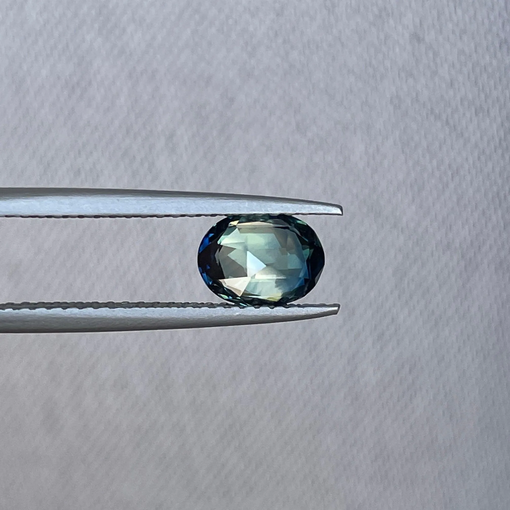 This 1.27 crt Parti Sapphire is well cut to bring out the best colour and lustre, and has a perfect colour blend