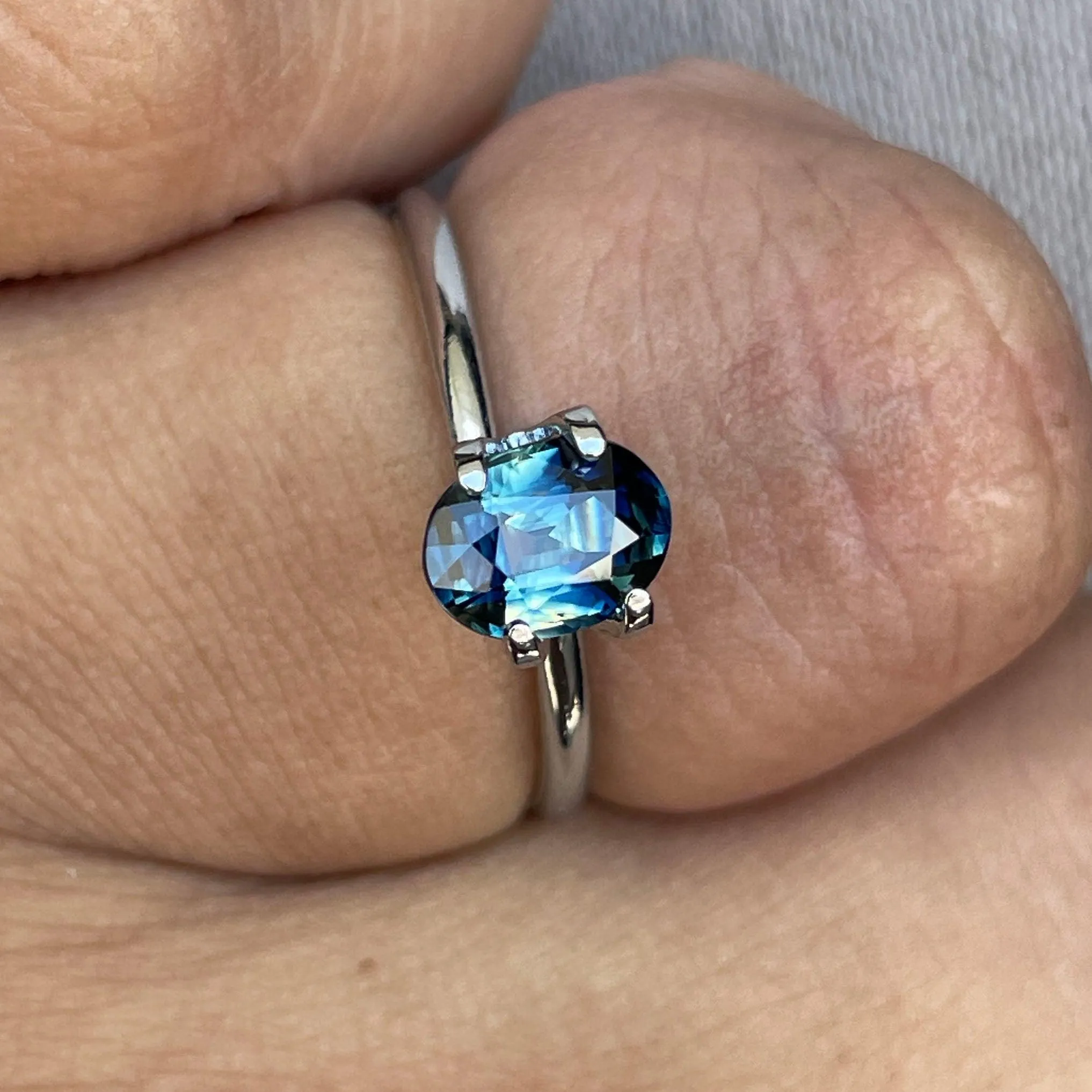 This 1.27 crt Parti Sapphire is well cut to bring out the best colour and lustre, and has a perfect colour blend