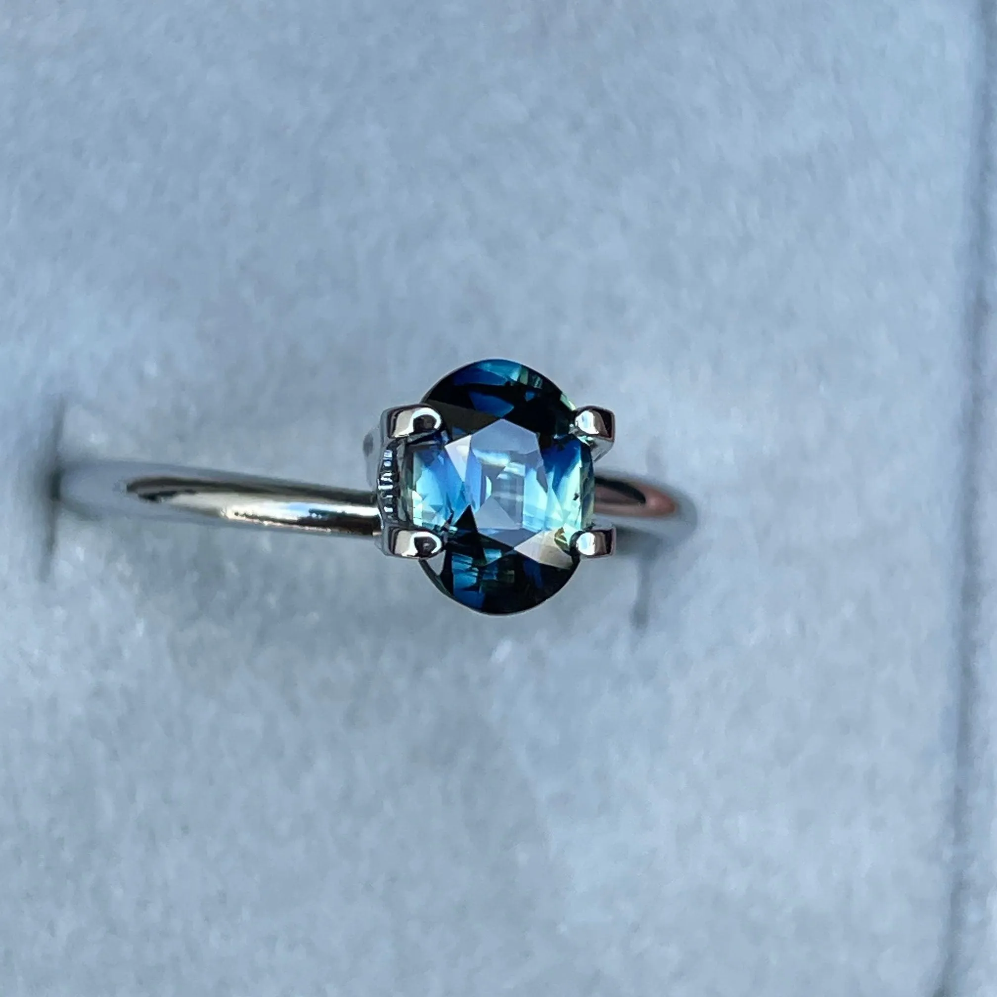 This 1.27 crt Parti Sapphire is well cut to bring out the best colour and lustre, and has a perfect colour blend