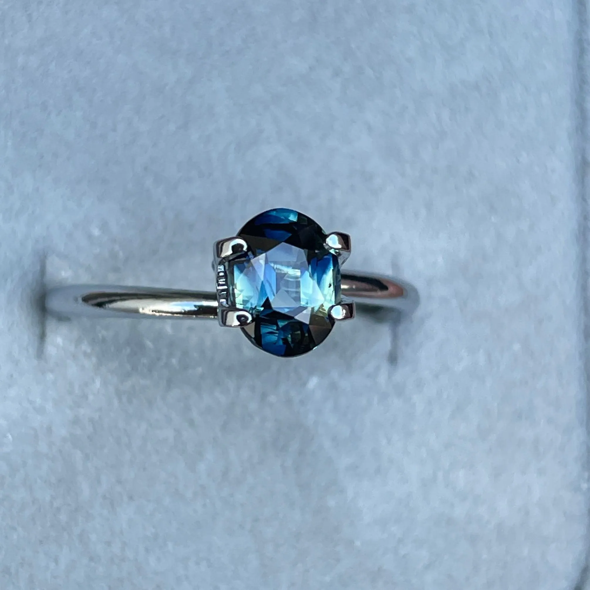 This 1.27 crt Parti Sapphire is well cut to bring out the best colour and lustre, and has a perfect colour blend