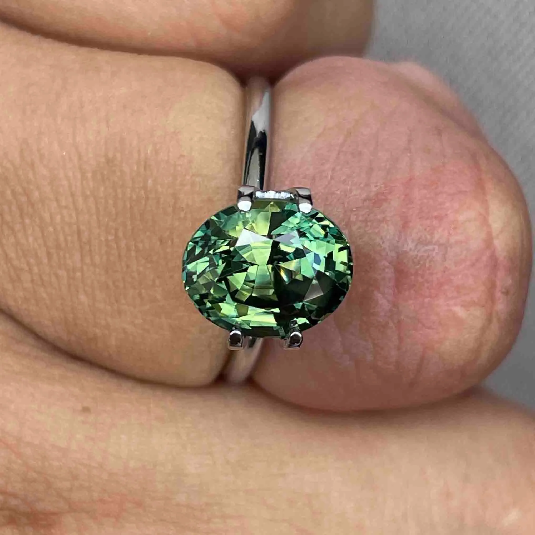 This 4.27 carat Green Sapphire is well cut to bring out the best colour and luster, and has a perfect colour blend.